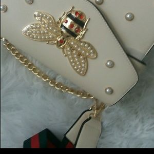 Bee Broadway clutch with pearls